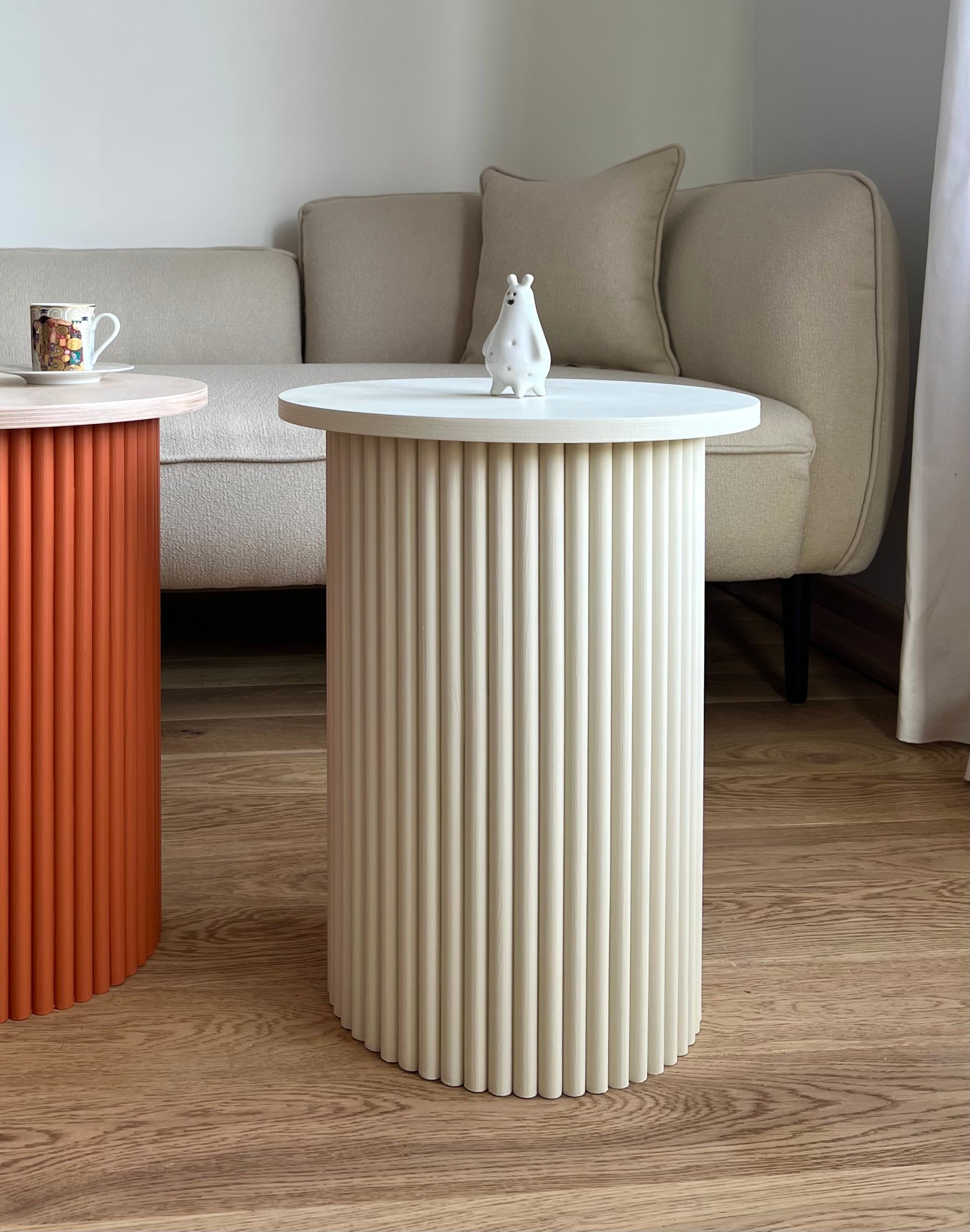 round and fluted bedside table in light beige –