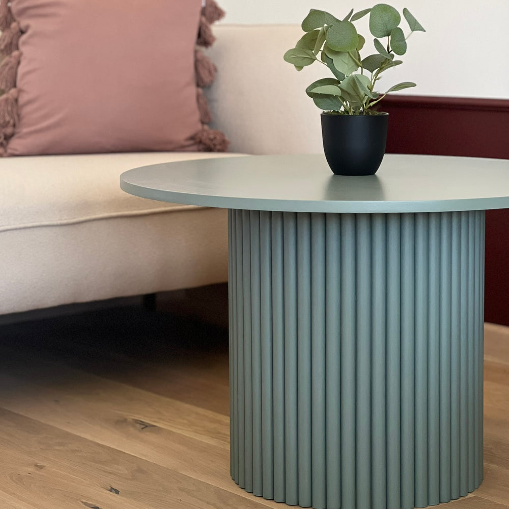 
                  
                    round fluted coffee table in dirty green Ø 70 cm
                  
                