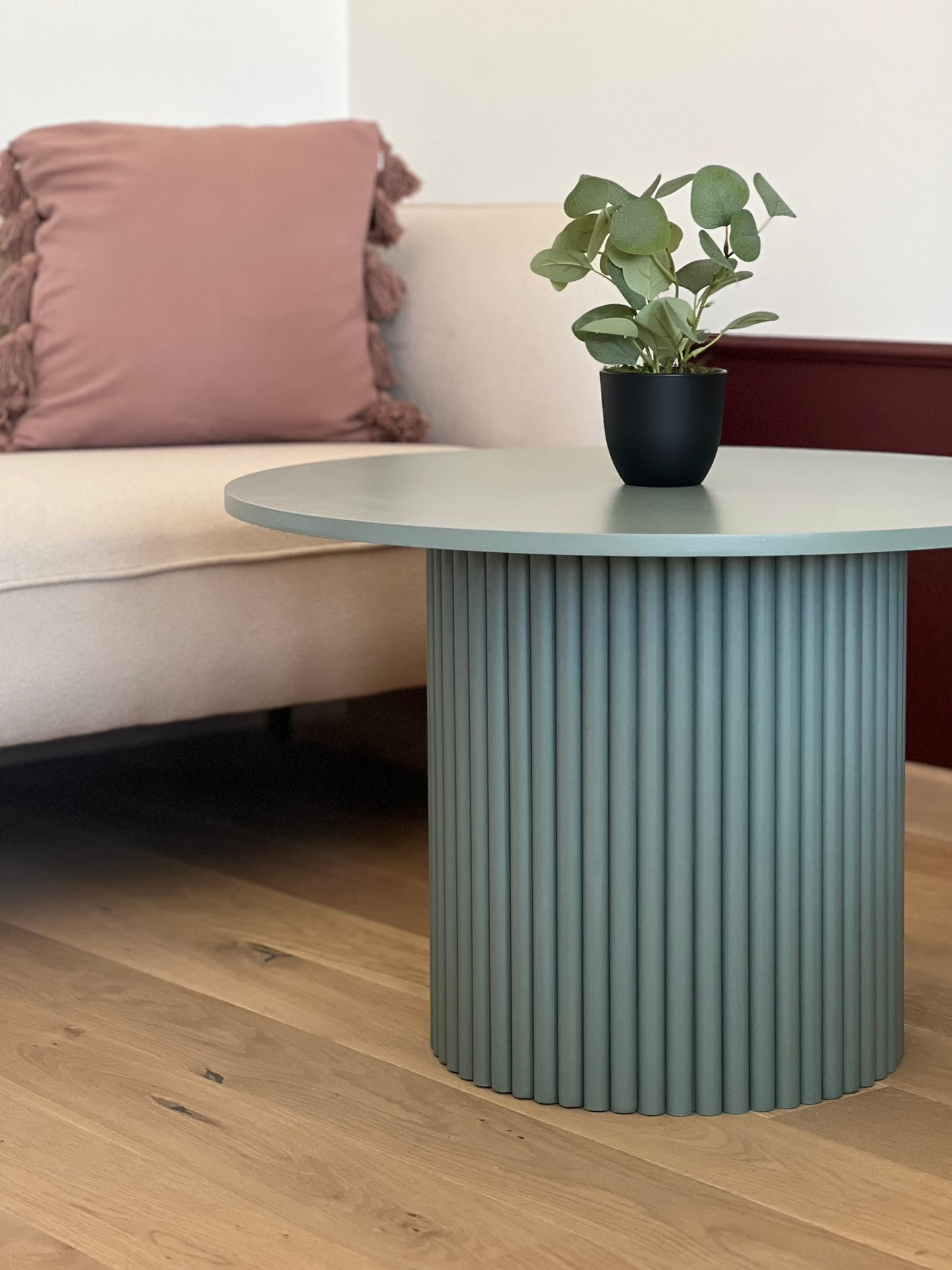 
                  
                    round fluted coffee table in dirty green Ø 70 cm
                  
                