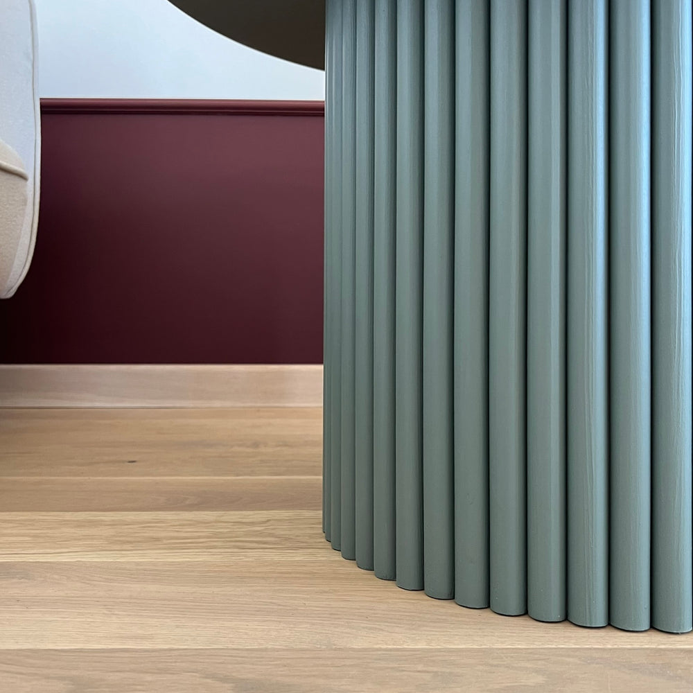 
                  
                    round fluted coffee table in dirty green Ø 70 cm
                  
                