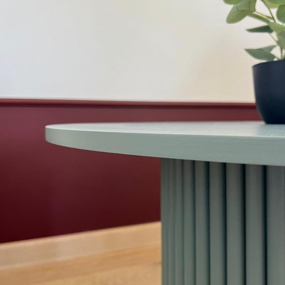 
                  
                    round fluted coffee table in dirty green Ø 70 cm
                  
                