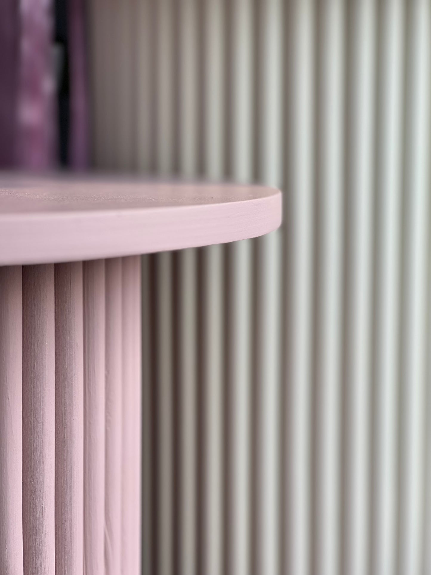 
                  
                    round and fluted bedside table in dusty pink
                  
                