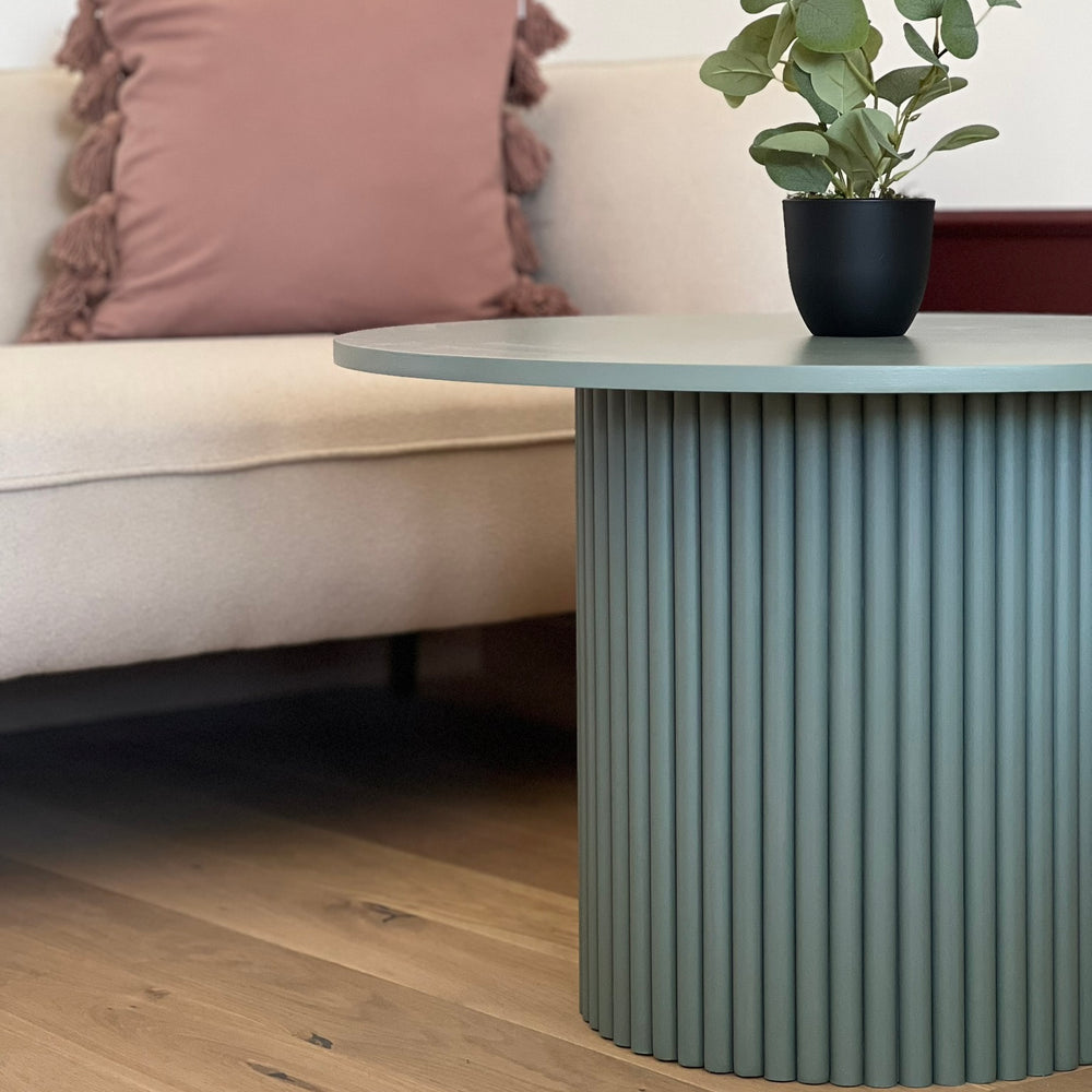 
                  
                    round fluted coffee table in dirty green Ø 70 cm
                  
                