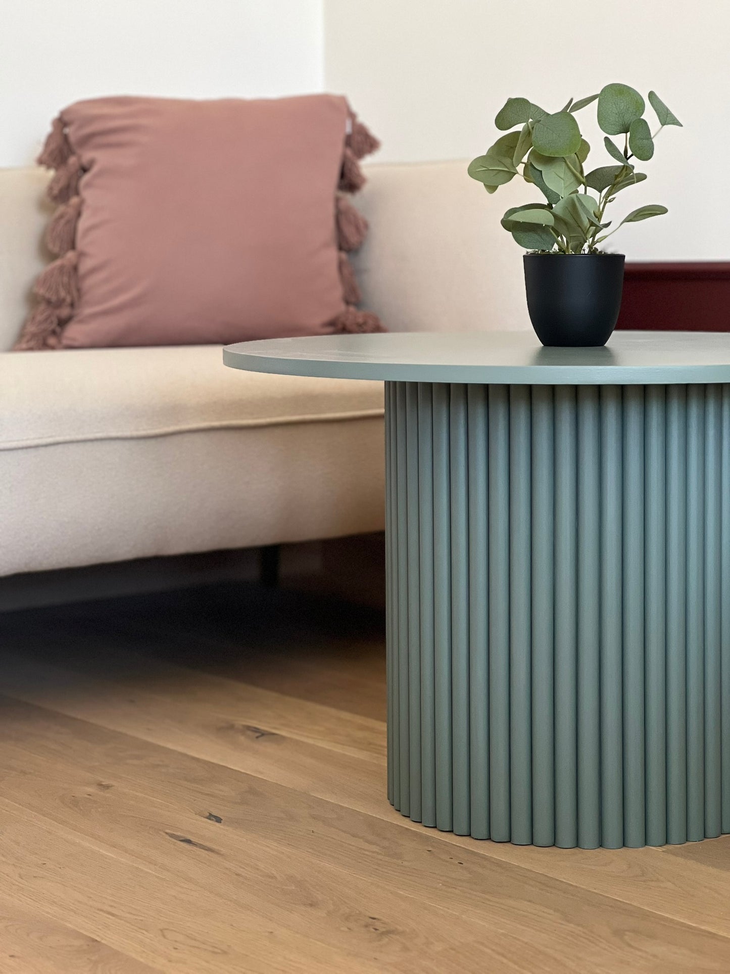 
                  
                    round fluted coffee table in dirty green Ø 70 cm
                  
                