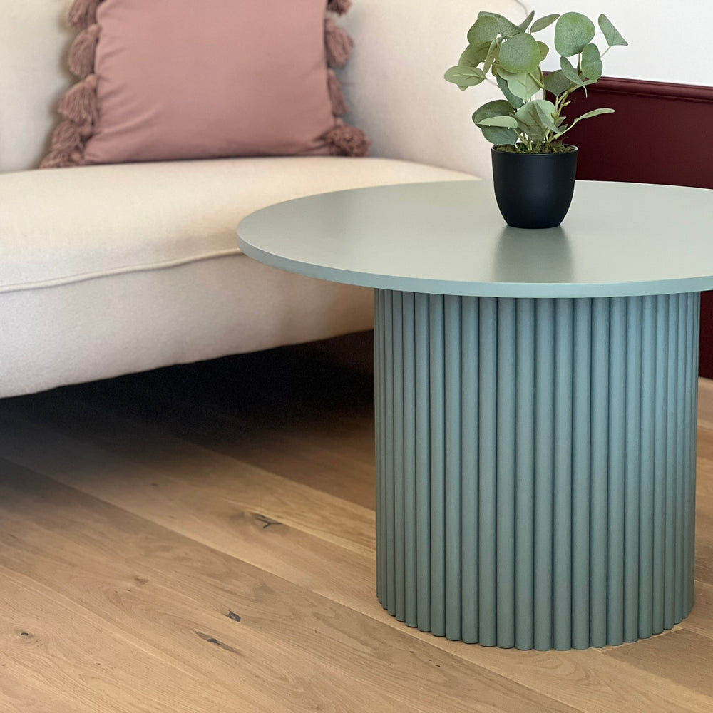 
                  
                    round fluted coffee table in dirty green Ø 70 cm
                  
                