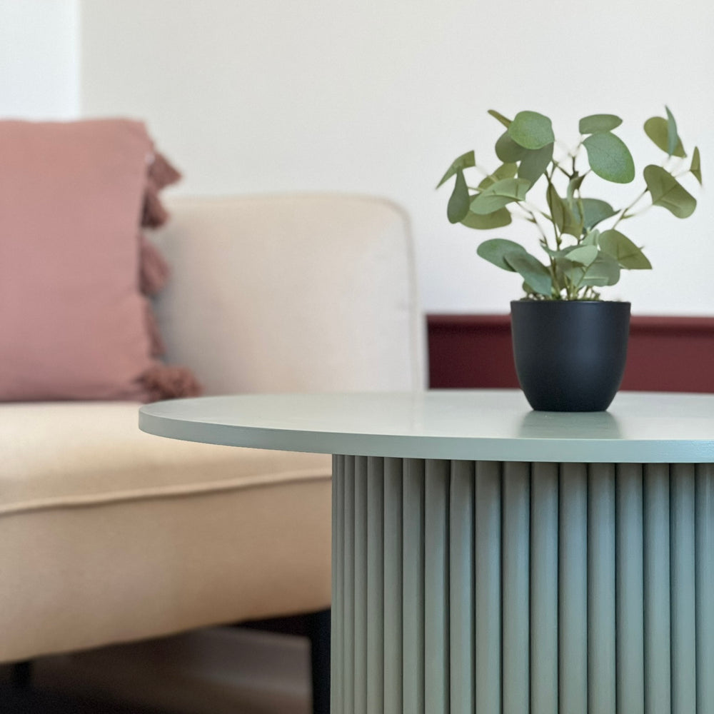 
                  
                    round fluted coffee table in dirty green Ø 70 cm
                  
                