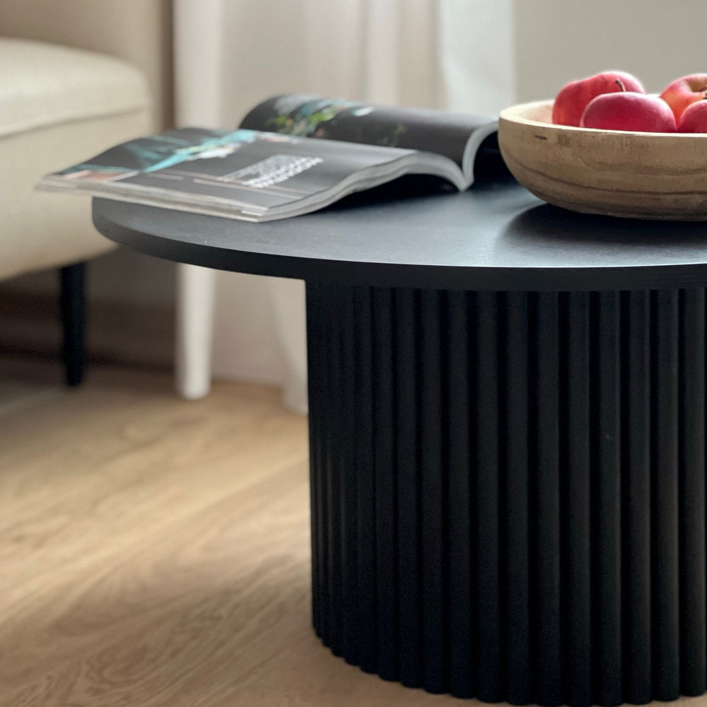 
                  
                    low black round fluted coffee table  Ø 70 cm
                  
                