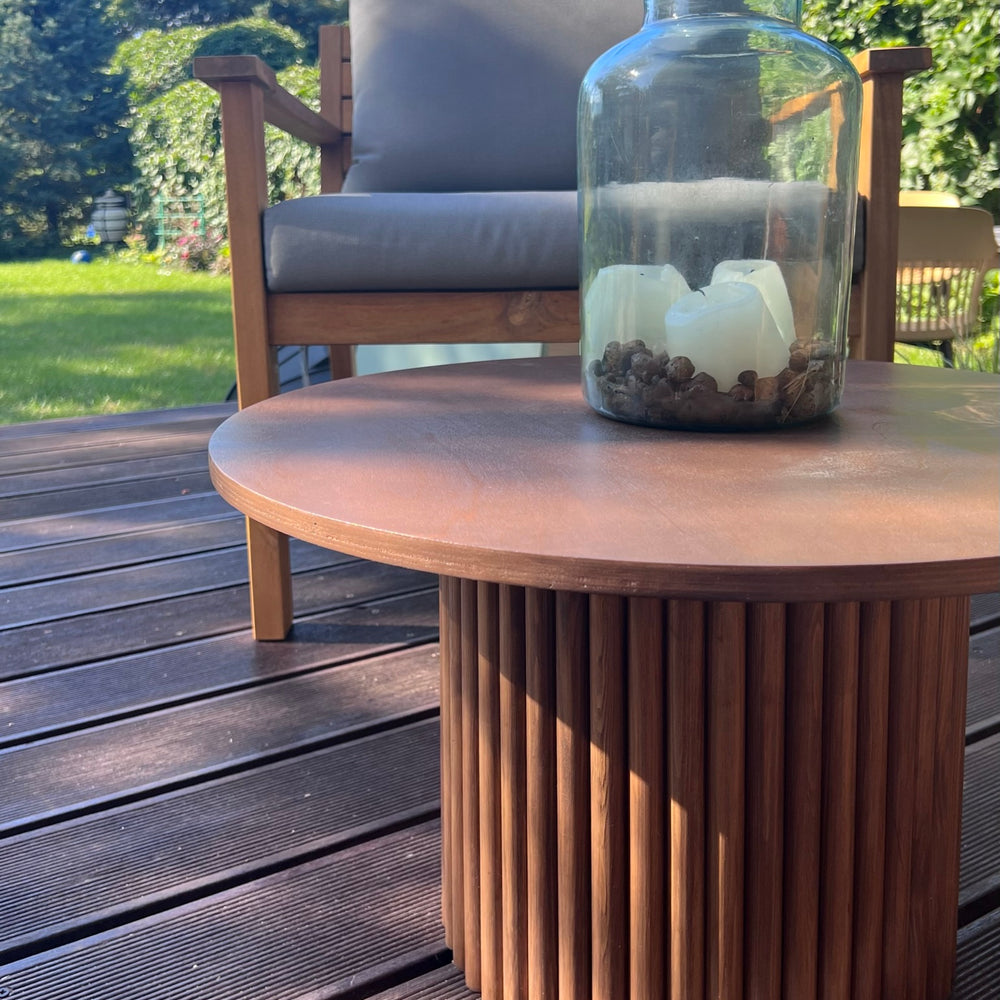 
                  
                    small round wooden coffee table on fluted pedestal Ø 60 cm H: 40 cm
                  
                