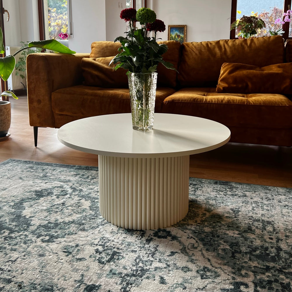 
                  
                    low beige round fluted coffee table  Ø 70 cm
                  
                