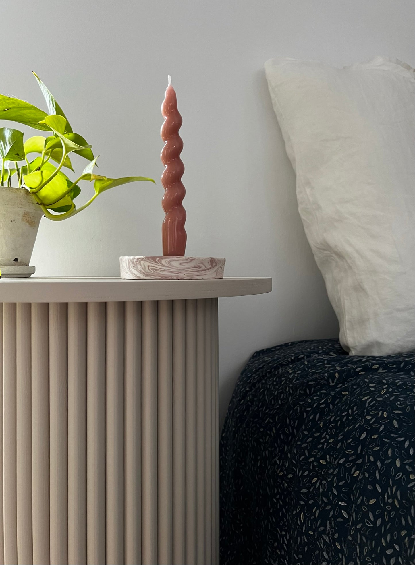 
                  
                    round and fluted bedside table in beige, cafe latte color
                  
                