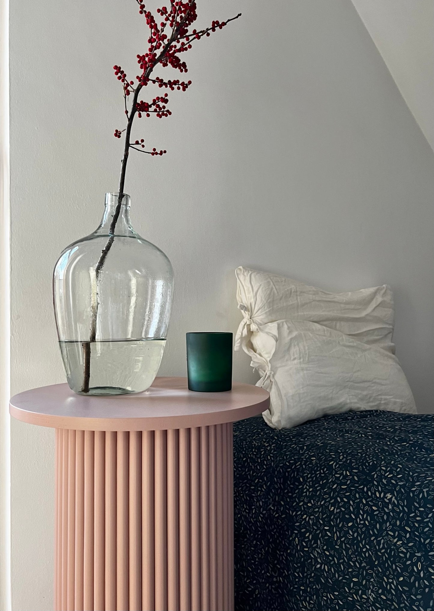 
                  
                    round and fluted bedside table in dusty pink
                  
                