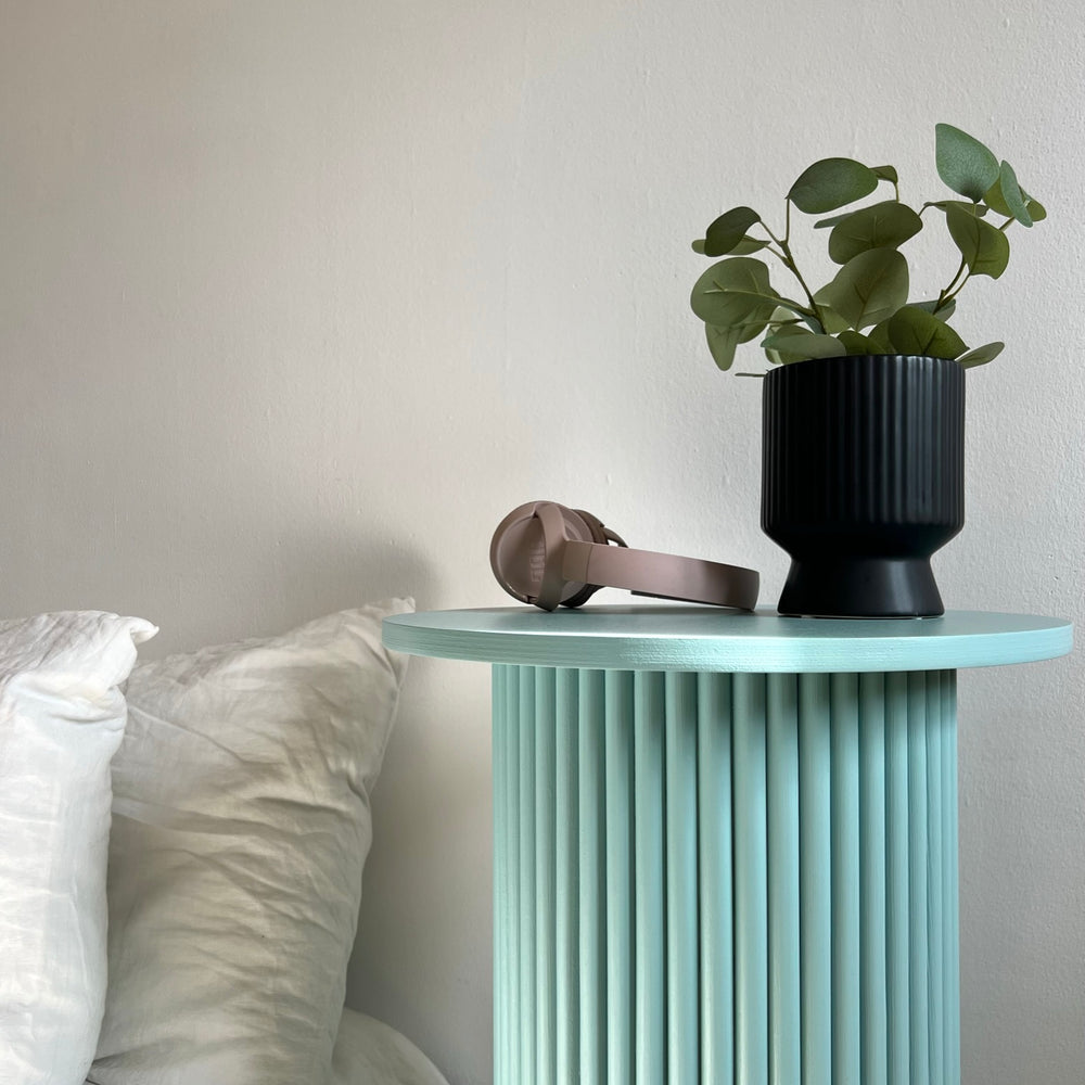 
                  
                    round and fluted bedside table in eggshell blue
                  
                