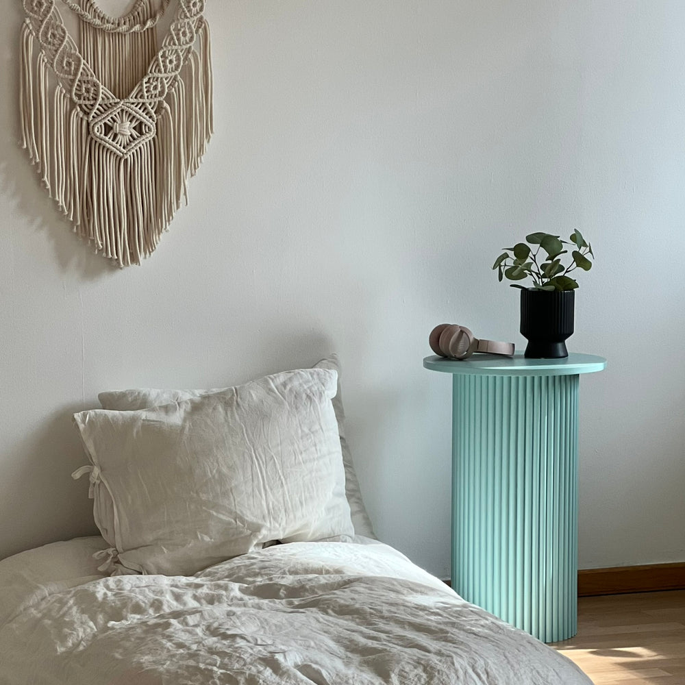 
                  
                    round and fluted bedside table in eggshell blue
                  
                