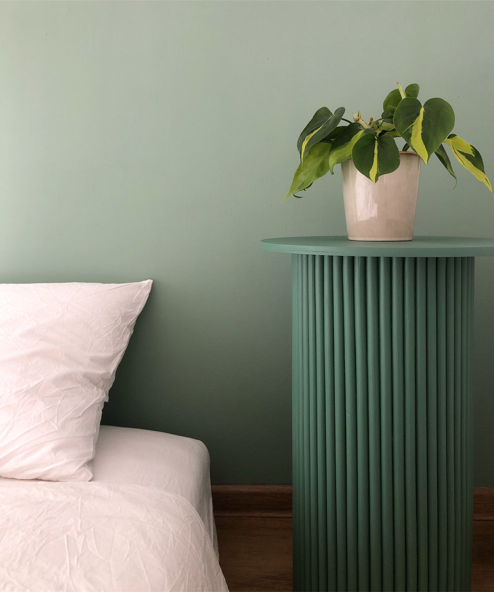 round and fluted bedside table in green