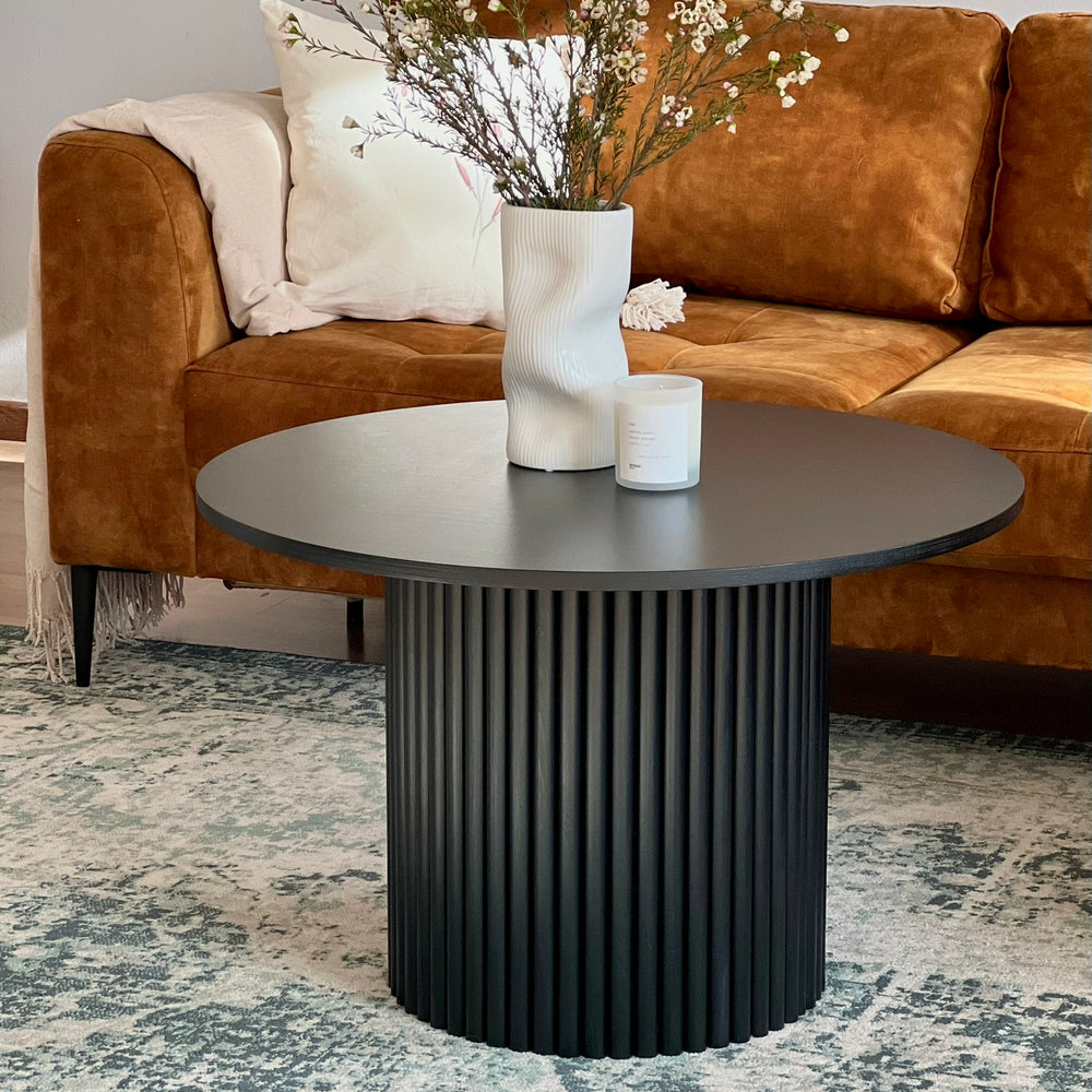 
                  
                    black round fluted coffee table  Ø 70 cm
                  
                