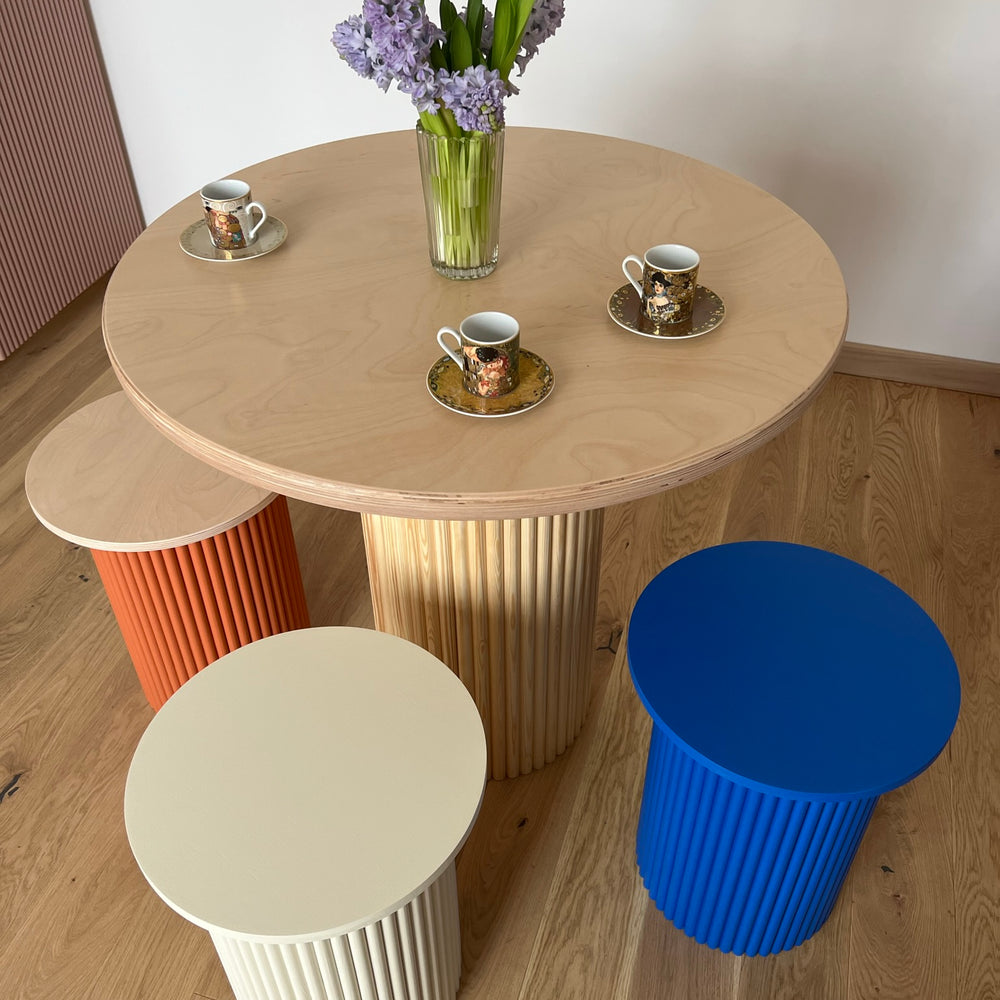 
                  
                    small round and fluted bedside table in klein blue
                  
                