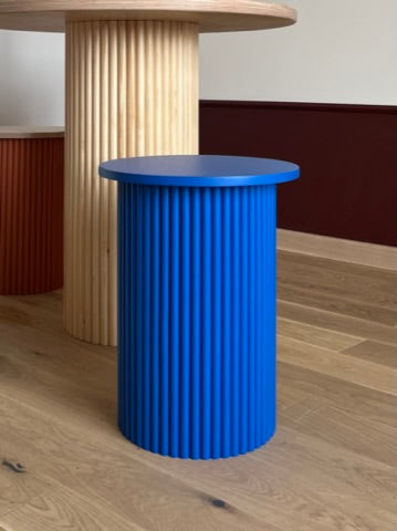 
                  
                    small round and fluted bedside table in klein blue
                  
                