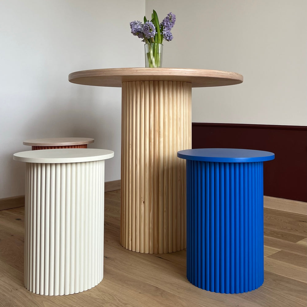 
                  
                    small round and fluted bedside table in klein blue
                  
                