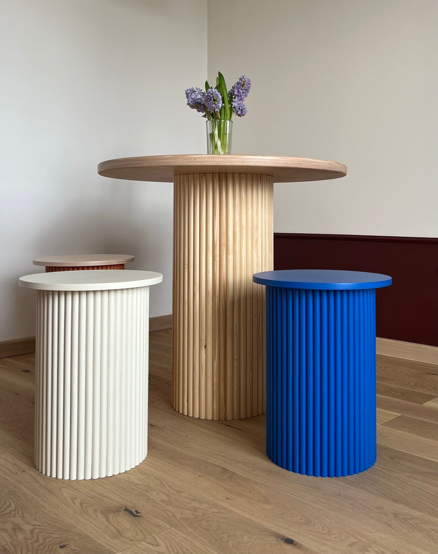 
                  
                    small round and fluted bedside table in klein blue
                  
                