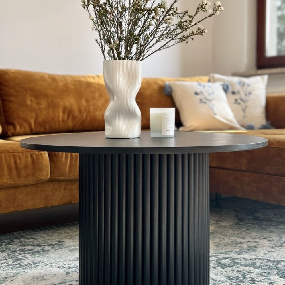 
                  
                    black round fluted coffee table  Ø 70 cm
                  
                