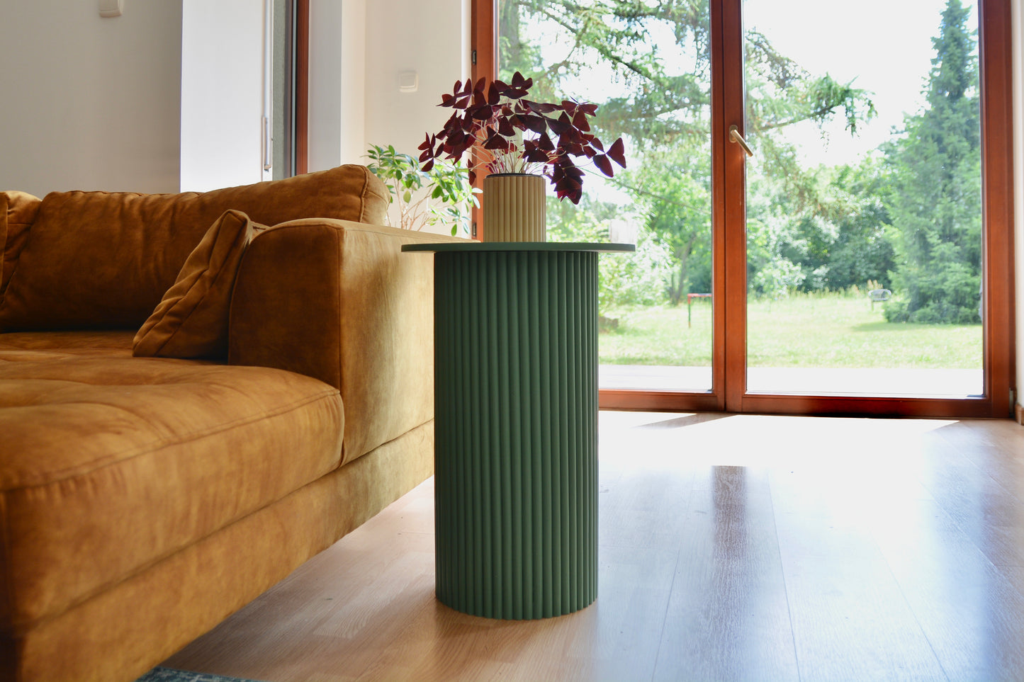 
                  
                    round and fluted bedside table in green
                  
                