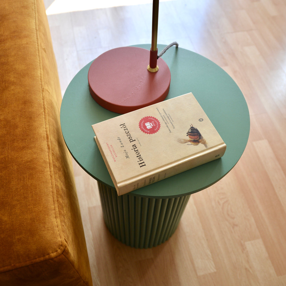 
                  
                    round and fluted bedside table in green
                  
                