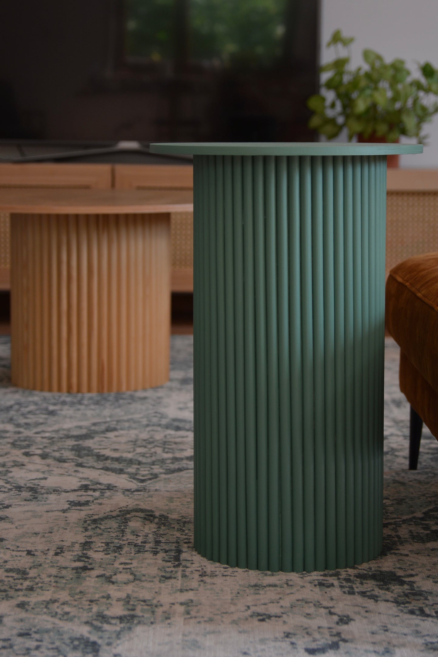 
                  
                    round and fluted bedside table in green
                  
                