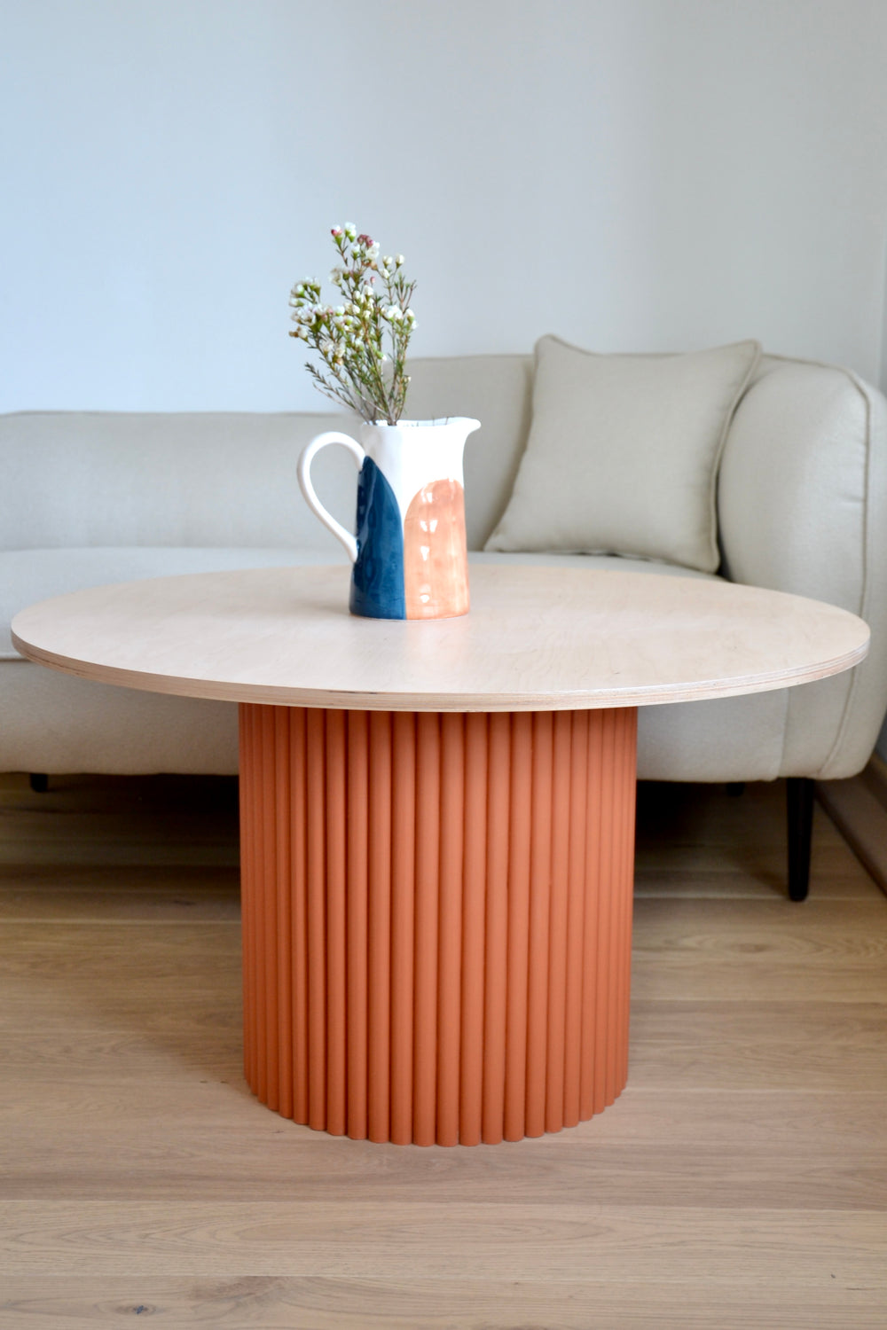 two-colored round fluted coffee table terracotta/natural wood Ø 80 cm