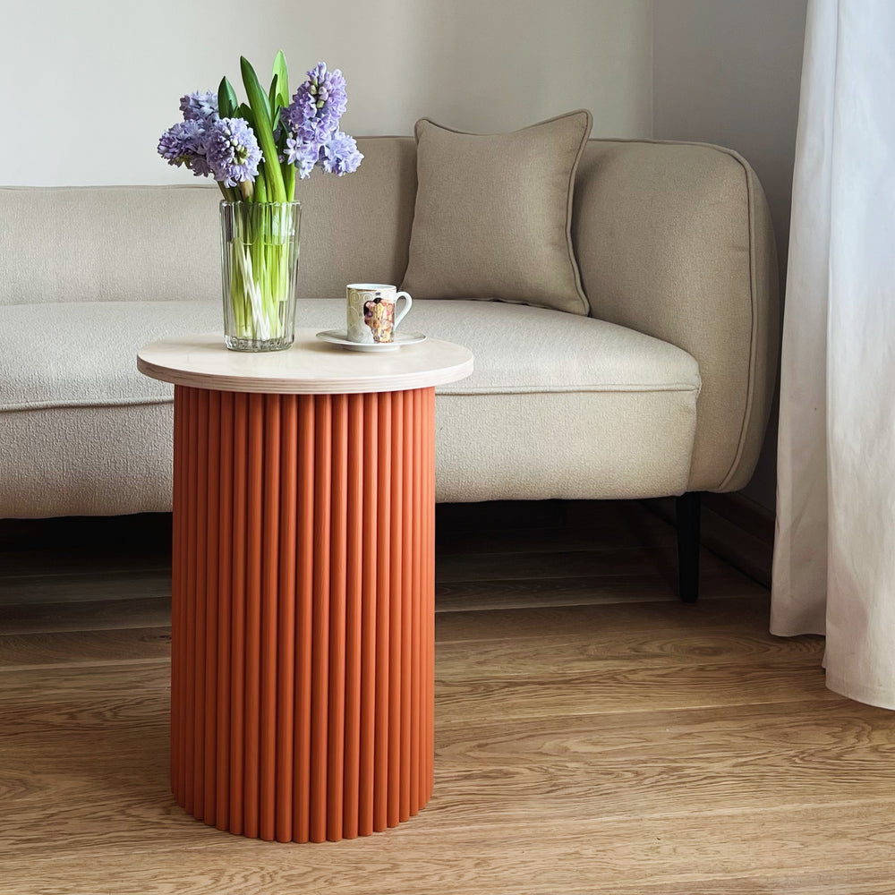 
                  
                    small two-colored round and fluted bedside table
                  
                