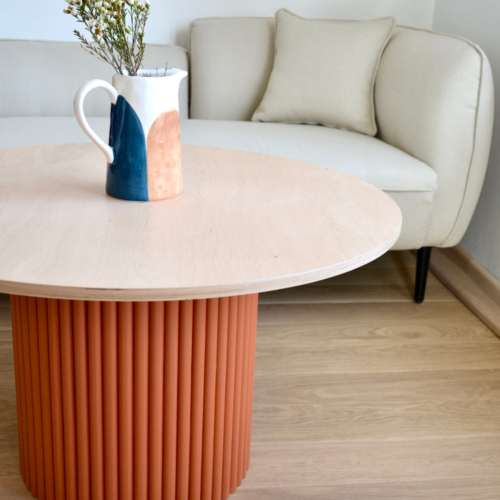 
                  
                    two-colored round fluted coffee table terracotta/natural wood Ø 80 cm
                  
                