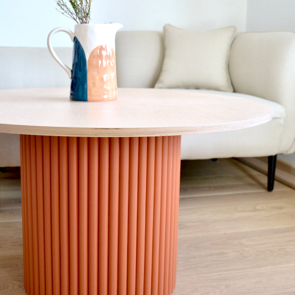 
                  
                    two-colored round fluted coffee table terracotta/natural wood Ø 80 cm
                  
                